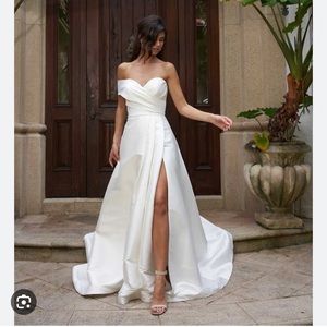 Brand new with tags, never worn, never altered essence of Australia wedding gown